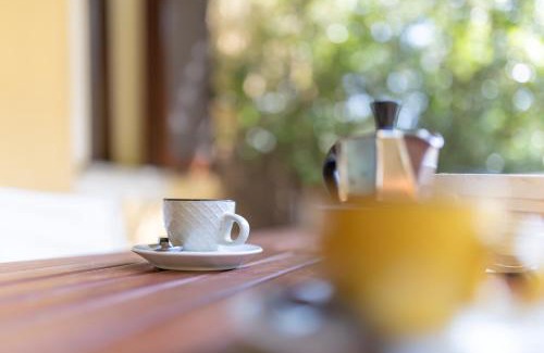 Viddalba Apartment | Corbezzolo: Pet-Friendly Retreat with Pool & Family Perks