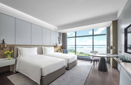Yunlong District Hotel | Experience Cordis, Xuzhou: 4-Star Serenity and Spa Retreat