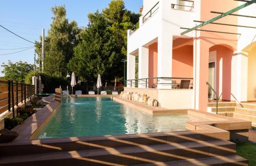 Vrahati Hotel | Corinthian Village: Oceanfront Bliss with Family-Friendly Perks
