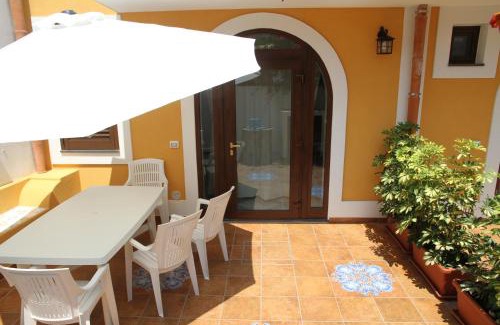 Canneto Apartment | Oceanfront Retreat Corinto: Guest Rated 9.2/10
