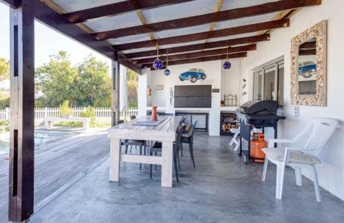 Onrus House | Corner Delight: Ocean View Retreat with Full Backup Power