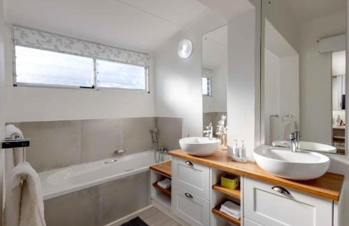 Onrus House | Corner Delight: Ocean View Retreat with Full Backup Power