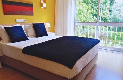 Caldelas House | Discover Corredoura Garden: Family-Friendly with Hot Tub
