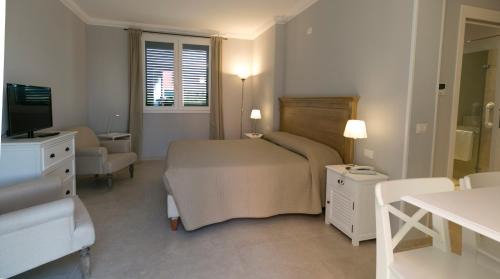 Paceco Resort | Discover Corte Olea Resort: Oceanfront Haven with Pool