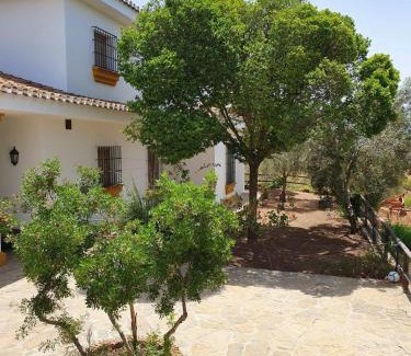 Villanueva del Rosario Villa | Pet-Friendly Retreat at Cortijo El Arrejadero - 9.4/10 Rating