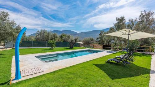Orgiva House | Discover Cortijo Villa Maroma Órgiva: Family-Friendly Retreat
