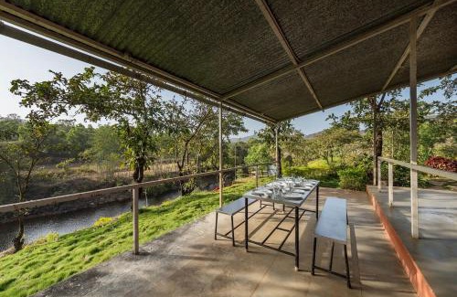 Ambavna Villa | CosmicStays Lazy River Cottage-Stargazers Paradise