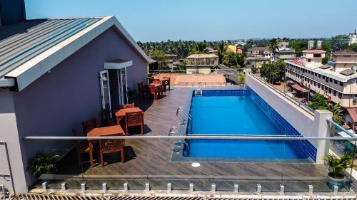 Margao Hotel | Relax at Cosmique Clarks Inn Suites Goa with Pool & Dining