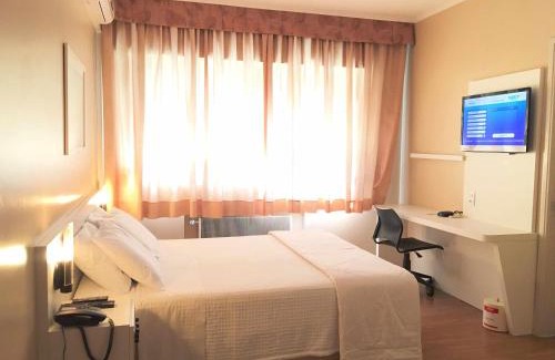Centro Hotel | Relax at Cosmos Hotel: Exceptional Ratings & Key Amenities