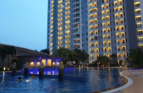 Surabaya Apartment | Comfortable Cosmy Orchard Apartment with Pool in Surabaya