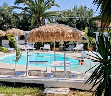Ricadi Resort | Discover Villaggio Costa Real: Oceanfront Retreat with Pool