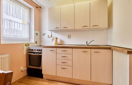 Svoboda nad Upou Apartment | Cozy Apartment for 4 with WiFi, Patio & Pet-Friendly Amenities