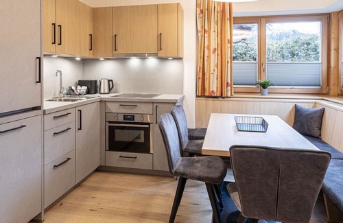 Reith bei Kitzbuehel Apartment | Cosy apartment for 6 guests with hot tub, WIFI, TV, balcony, pets allowed and parking