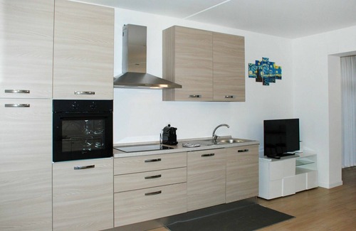 Bigogno Apartment | Cozy Lake View Apartment with Pool and Modern Amenities