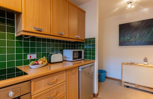 South Galson Apartment | Inviting Apartment for 4 with Terrace and Parking Available