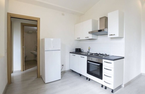Meina Apartment | Cosy apartment for 4 guests with pool, A/C, TV and parking
