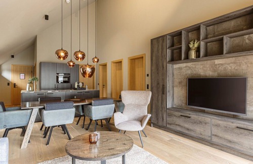 Schruns Apartment | Cosy apartment for 6 guests with pool, WIFI, TV, balcony and parking