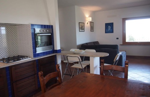Follonica Apartment | Ideal Apartment for 6 with Ocean View & Panoramic Patio