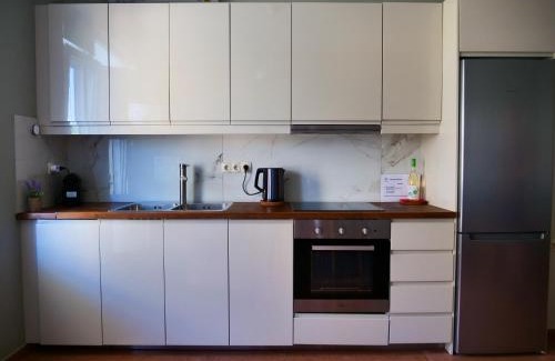 Makrys Tichos Apartment | Inviting Cosy Apartments Daphne - Guest Rated 9.8/10
