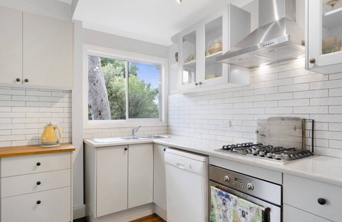 Macmasters Beach House | Charming Coastal Cottage: Walk to Beach, Pet Friendly Retreat