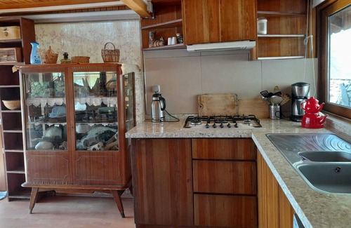 Ula Ski Chalet | Charming Cottage with Ocean View and Pool Access