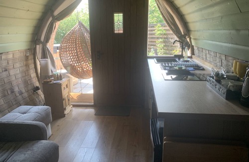 Sheerness House | Enchanting Hobbit House Retreat with Hot Tub & Pool