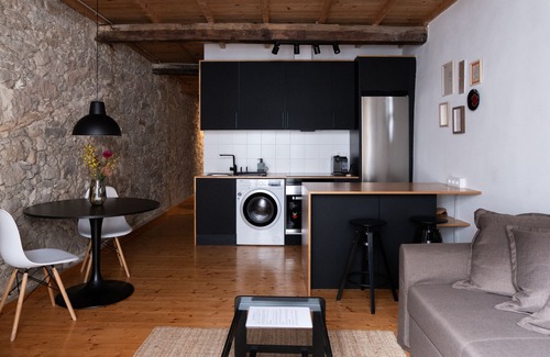 La Coruna Condo | Charming City Center Flat with Spa and Family Amenities