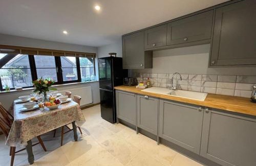 Blaisdon House | Cozy Grade II Listed Barn: Pet & Child Friendly Retreat