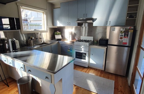 Newington House | Cozy Mid-Century Retreat with Pet-Friendly Amenities