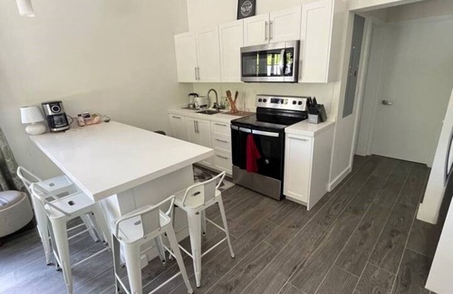 Northwest Point Apartment | Modern Coastal Retreat with Pool, Breakfast & Dive Access