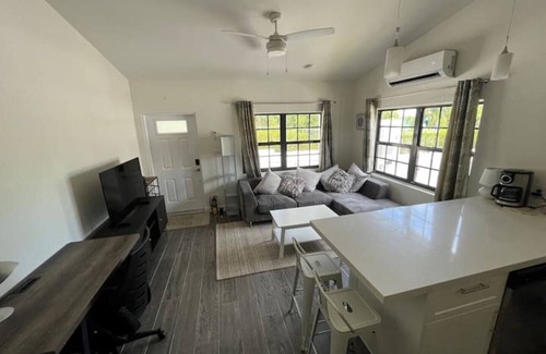 Northwest Point Apartment | Modern Coastal Retreat with Pool, Breakfast & Dive Access