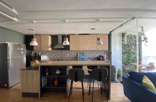 El Ensanche Apartment | Modern Flat in City Center, Steps from Beach & Malabata