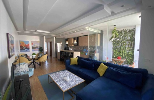 El Ensanche Apartment | Modern Flat in City Center, Steps from Beach & Malabata
