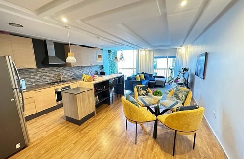 El Ensanche Apartment | Modern Flat in City Center, Steps from Beach & Malabata