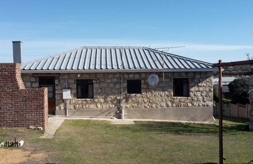 Still Bay House | Charming Stone Cottage: 4-Star Retreat for Families & Pets