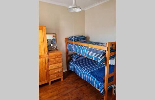 Still Bay House | Charming Stone Cottage: 4-Star Retreat for Families & Pets