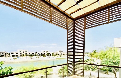 Taqah Apartment | Cozy Studio with Lagoon View at Hawana Resort