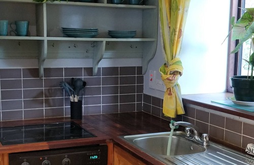 Tuamgraney House | Cozy Two-Bedroom Lodge near Raheen Woods, Pet-Friendly Stay