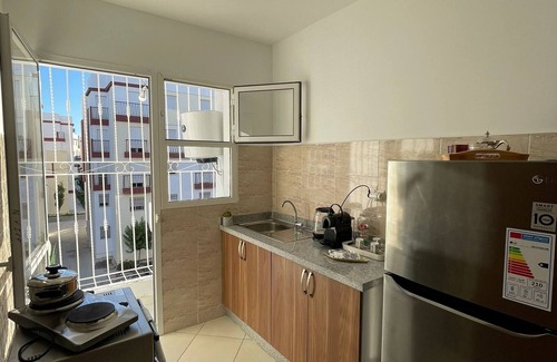 Boukhalef Apartment | Discover Cotta Roman Apartment: Family-Friendly Comfort