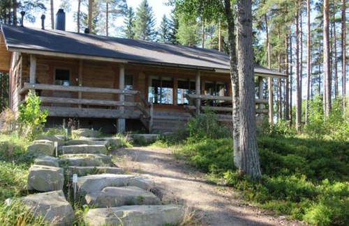 Tampere Ski Chalet | Relax at Cottage Harmaa with Hot Tub & Pet-Friendly Perks