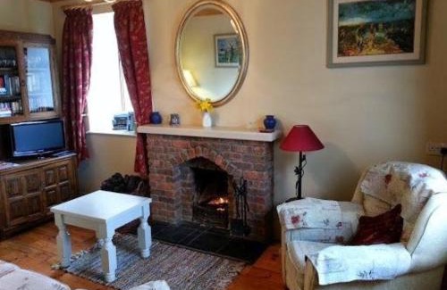 Gurteen House | Cozy Holiday Home in Moydough with Open Fireplace