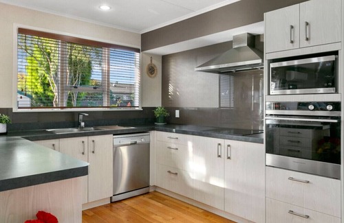 Taupo House | Lake View Retreat - Central Location with Family Friendly Perks