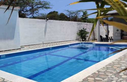 Tubara Cottage | Beachside Cottage with Pool, Bar, and Market Access