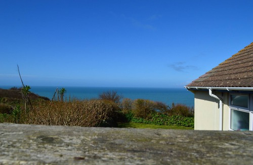 Mullion House | Coastal Cottage: Pet-Friendly Retreat with Pool and Tennis