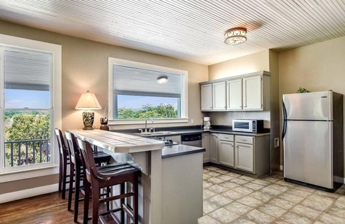 Leakey House | Relaxing Riverfront Cottage with Spa and Pet-Friendly Amenities