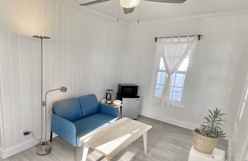 North Palmetto Point Cottage | Beachfront Cottages with Pool & Spa on Pink Sand Paradise