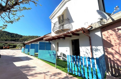 Baunei House | Cozy Country & Beach Suites with Child-Friendly Amenities