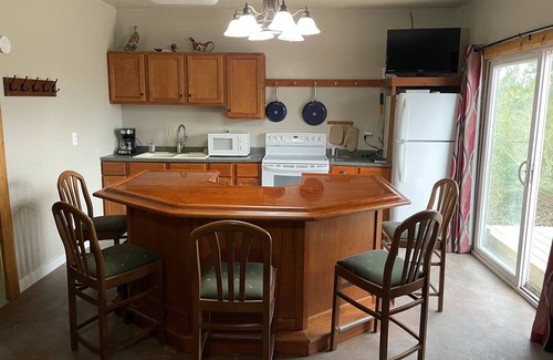 Swift County Cabin | Serene Country Cabin Retreat with Hot Tub and Pet-Friendly Perks
