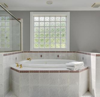 Brentwood Apartment | Cozy Country Cove: Fireplace, Hot Tub & Eco-Friendly Stay