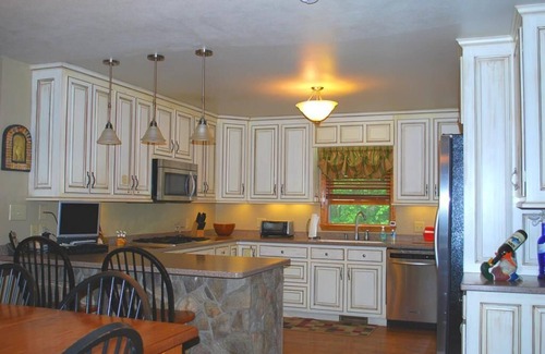 Scottville House | Pet-Friendly River Retreat with Game Room & Outdoor Fire Pit